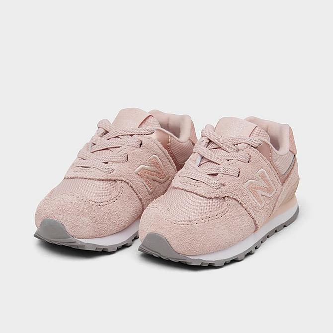 Three Quarter view of Girls' Toddler New Balance 574 Casual Shoes in Pink Haze/White Click to zoom