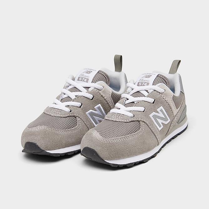 Three Quarter view of Boys' Toddler New Balance 574 Suede Casual Shoes in Grey/White Click to zoom