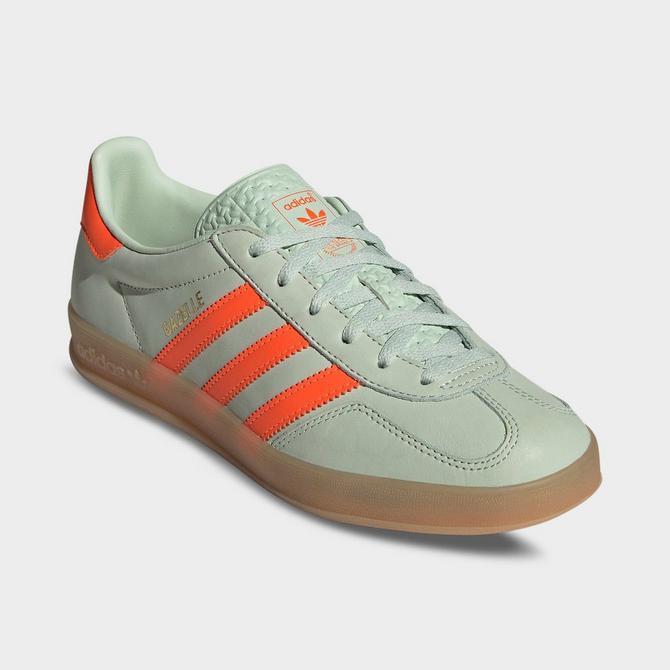 Three Quarter view of Women's adidas Originals Gazelle Casual Shoes in Linen Green/Solar Orange/Gum Click to zoom