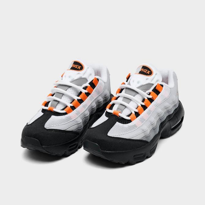 Three Quarter view of Little Kids' Nike Air Max 95 Casual Shoes in Black/Cool Grey/Bright Mandarin Click to zoom