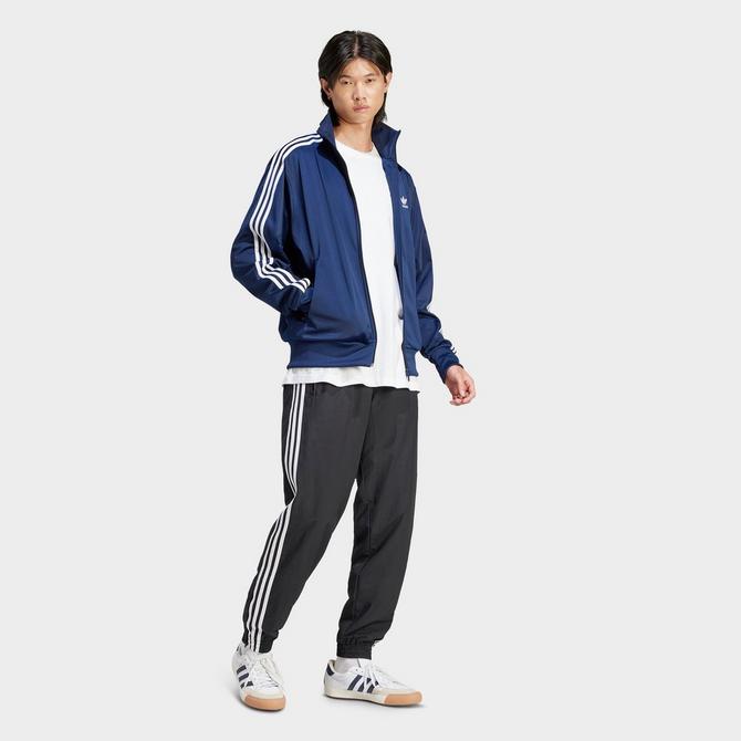 [angle] view of Men's adidas Originals adicolor Classics Firebird Track Jacket in Night Indigo Click to zoom