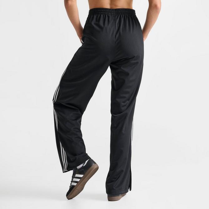 [angle] view of Women's adidas Originals Firebird Loose Track Pants in Black Click to zoom