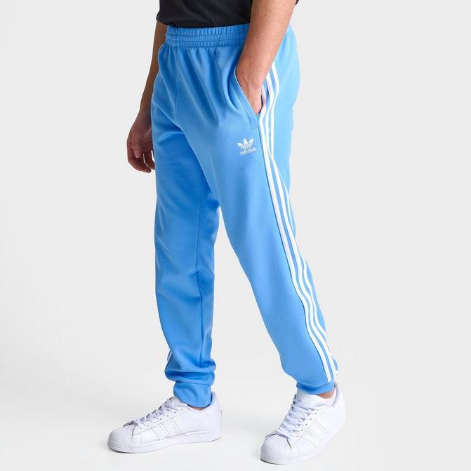 Blue track pants adidas online