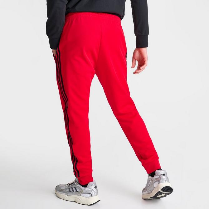 Adidas originals superstar track shop pants  mens red