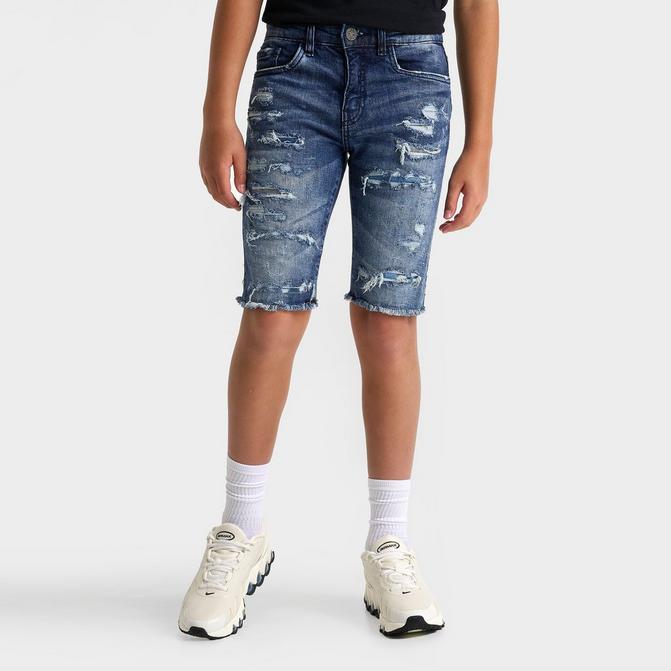 [angle] view of Kids' Jordan Craig Ripped Denim Shorts in Deep Blue Click to zoom