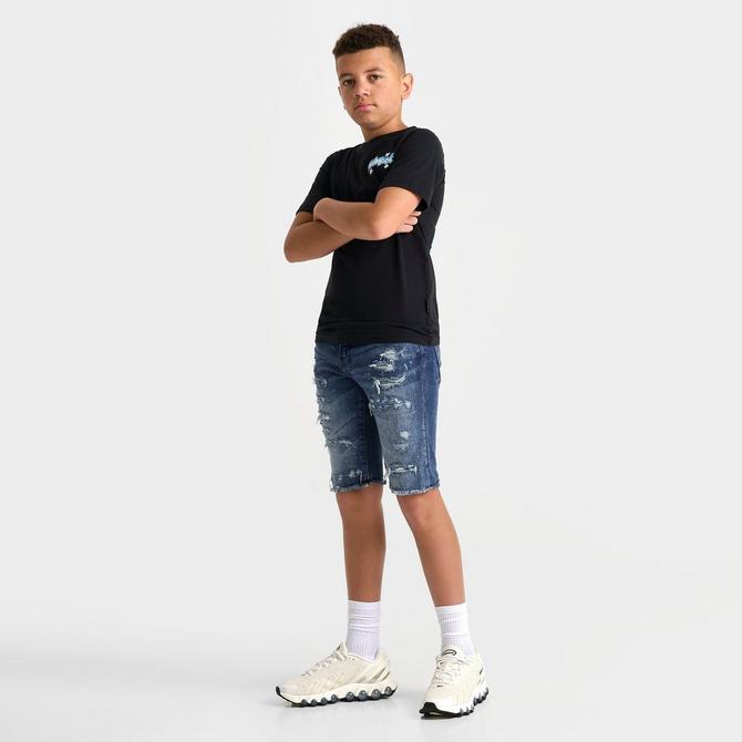 [angle] view of Kids' Jordan Craig Ripped Denim Shorts in Deep Blue Click to zoom
