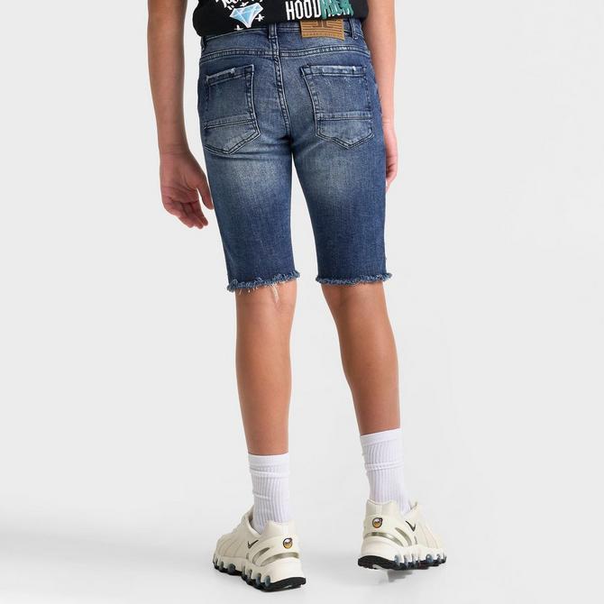 [angle] view of Kids' Jordan Craig Ripped Denim Shorts in Deep Blue Click to zoom