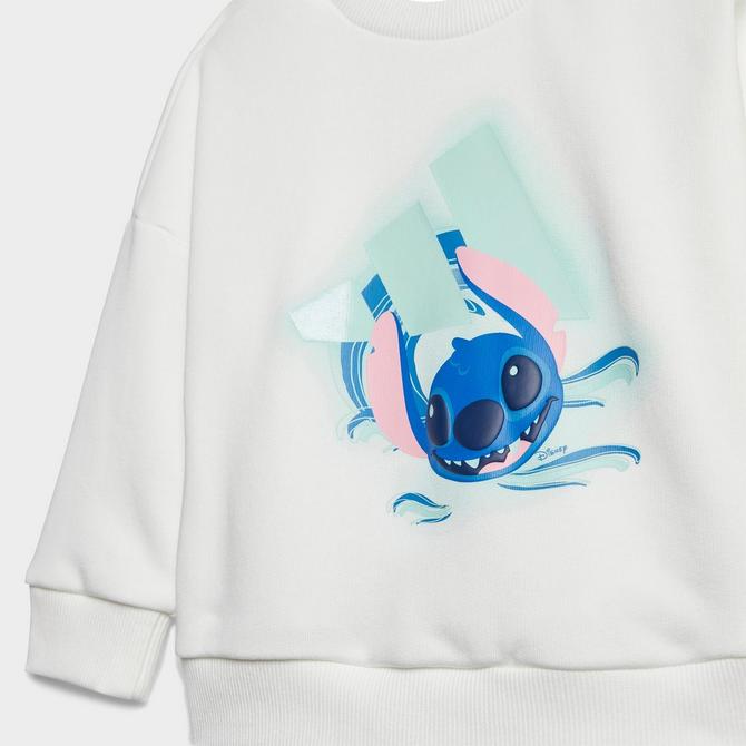 [angle] view of Infant and Toddler adidas x Disney Lilo And Stitch Sweatshirt and Jogger Pants Set in White/Semi Flash Aqua Click to zoom