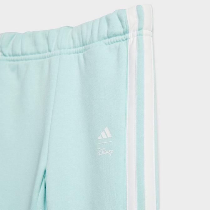[angle] view of Infant and Toddler adidas x Disney Lilo And Stitch Sweatshirt and Jogger Pants Set in White/Semi Flash Aqua Click to zoom