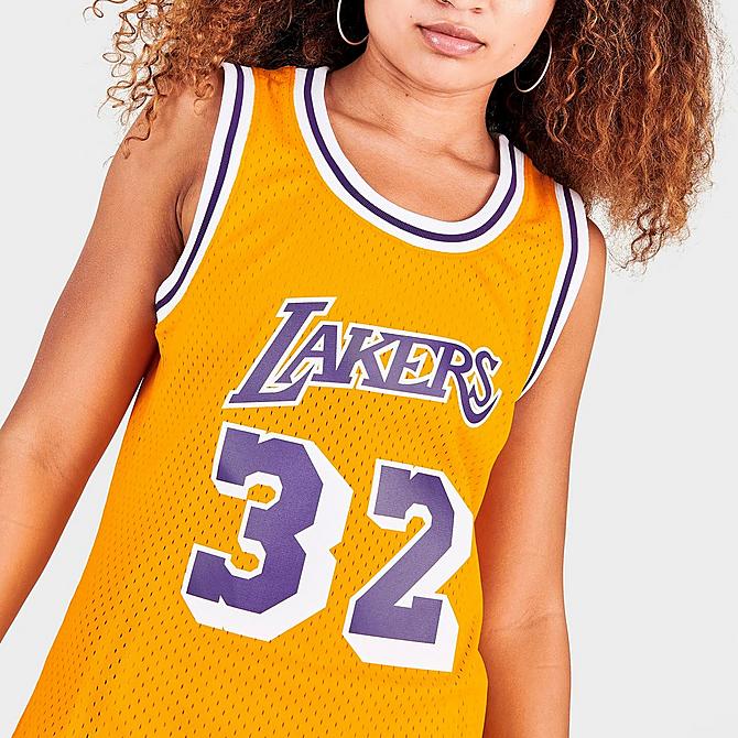 On Model 5 view of Women's Mitchell & Ness Los Angeles Lakers NBA Magic Johnson Hardwood Classics 1984-85 Swingman Jersey in Gold Click to zoom