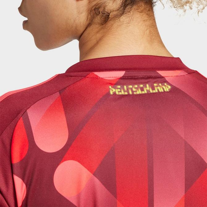 [angle] view of Women's adidas Germany 2025 Away Jersey in Team Collegiate Burgundy Click to zoom