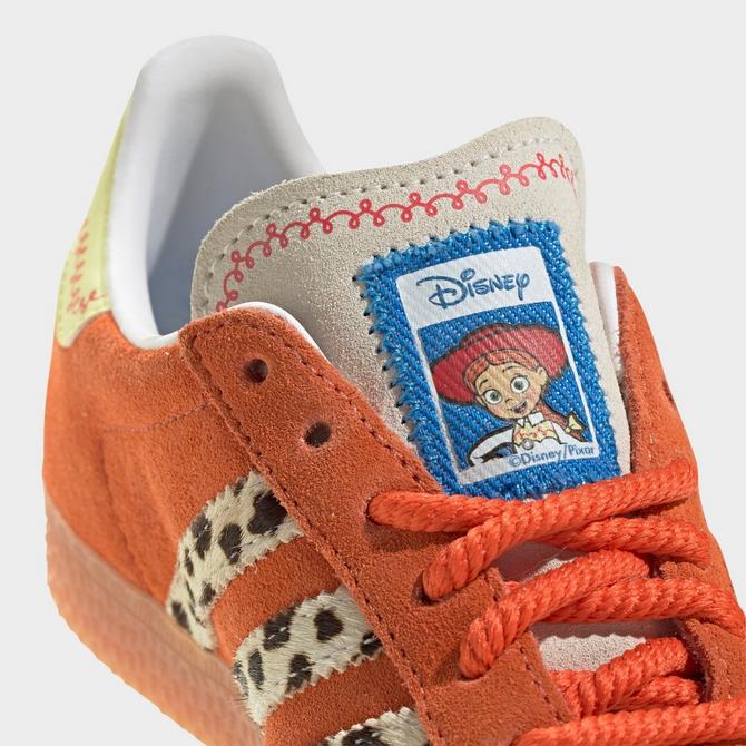 Front view of Little Kids' adidas Originals x Toy Story Gazelle Casual Shoes in Orange/White/Gum Click to zoom