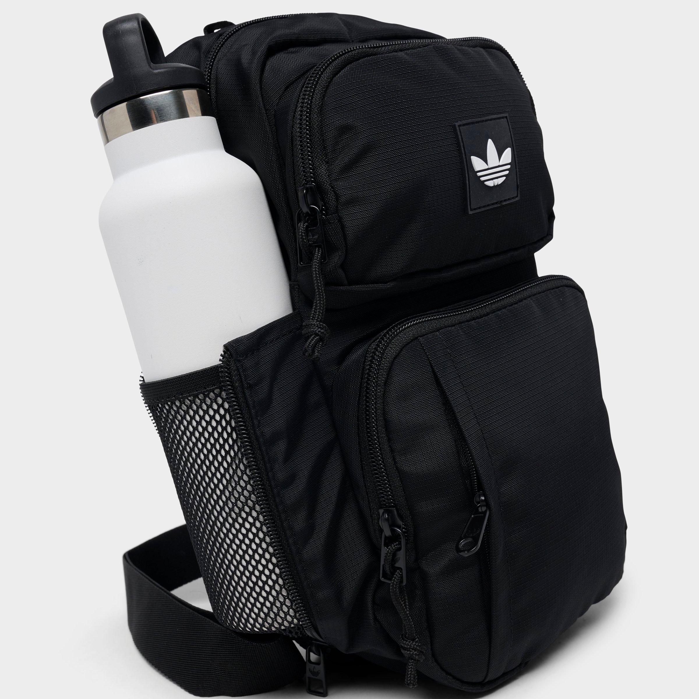 adidas citywide sling backpack Sling, Jersey Black/Scarlet, One Size Bags, Wallets and Luggage Multiple zippered pockets keep your phone Buy Adidas, National Sling Backpack