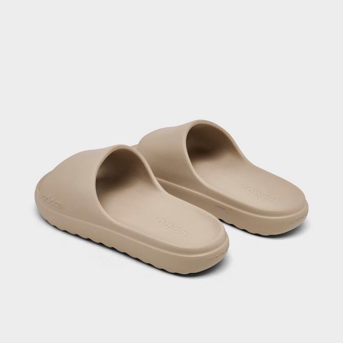 Left view of Women's adidas adilette Lumia Slide Sandals in Clay Brown/Clay Brown/Clay Brown Click to zoom