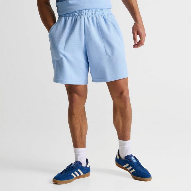 [angle] view of Men's adidas Originals Trefoil Essentials 7" Waffle Shorts in Clear Sky Click to zoom