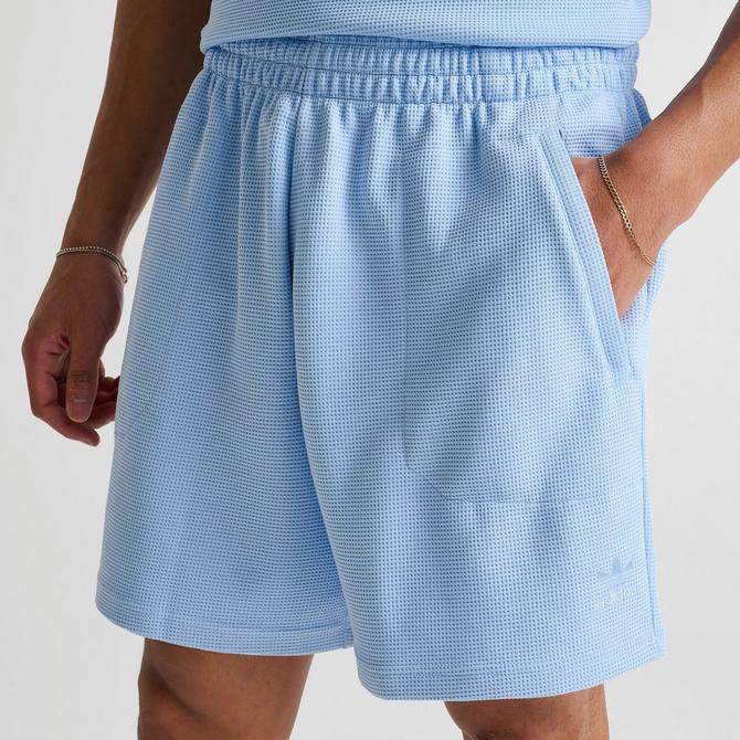 [angle] view of Men's adidas Originals Trefoil Essentials 7" Waffle Shorts in Clear Sky Click to zoom