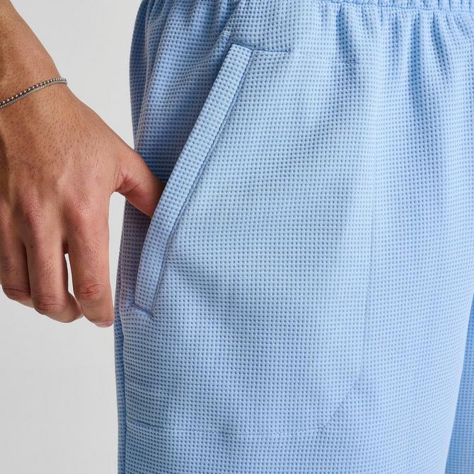 [angle] view of Men's adidas Originals Trefoil Essentials 7" Waffle Shorts in Clear Sky Click to zoom