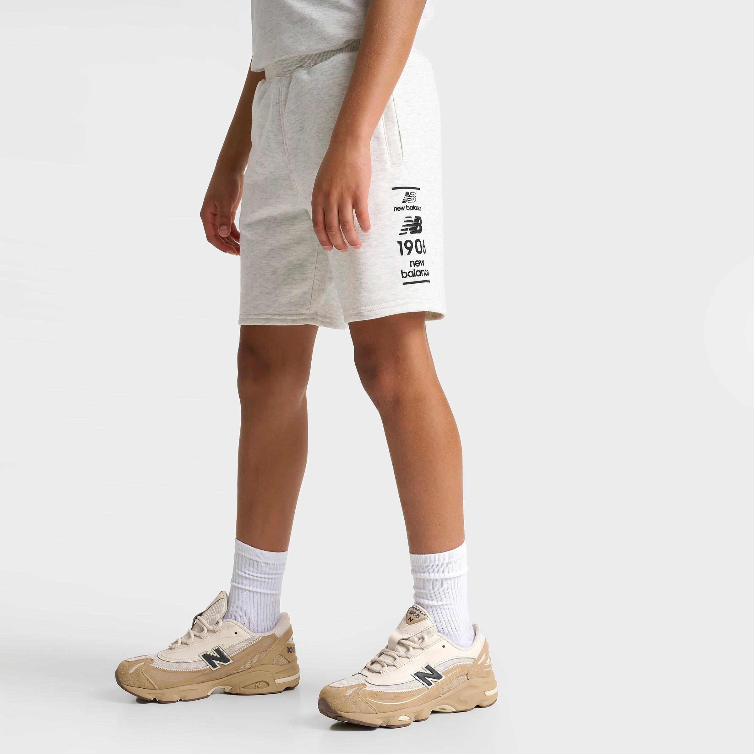 ★★New Balance★★ NBNEF21433 UNI Flying Lettering Short Sl Men's New Balance Athletics Flying NB Logo T-Shirt | Finish Line