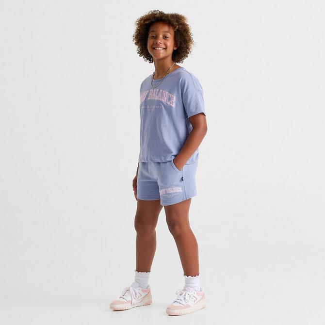 [angle] view of Girls' New Balance Club Shorts in Dusk Shower Click to zoom