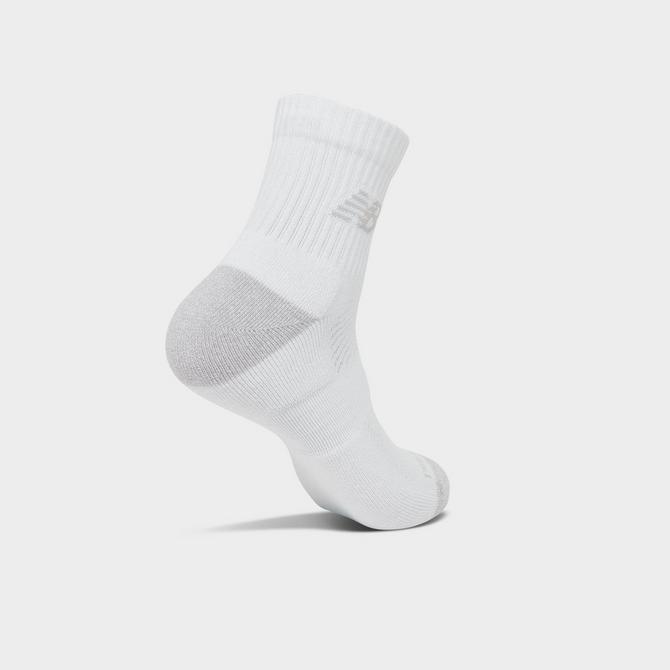 Left view of New Balance Active Quarter Socks (3-Pack) in Core White Click to zoom
