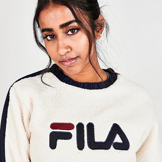 On Model 5 view of Women's Fila Logo Fleece Crewneck Sweatshirt in Tofu/Tawny Click to zoom