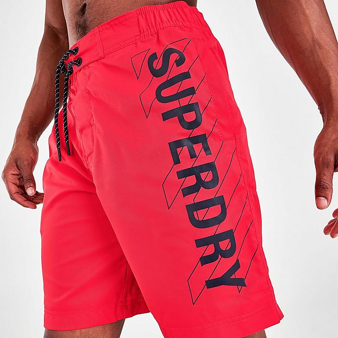 On Model 5 view of Men's Superdry Classic Board Shorts in Bright Red Click to zoom