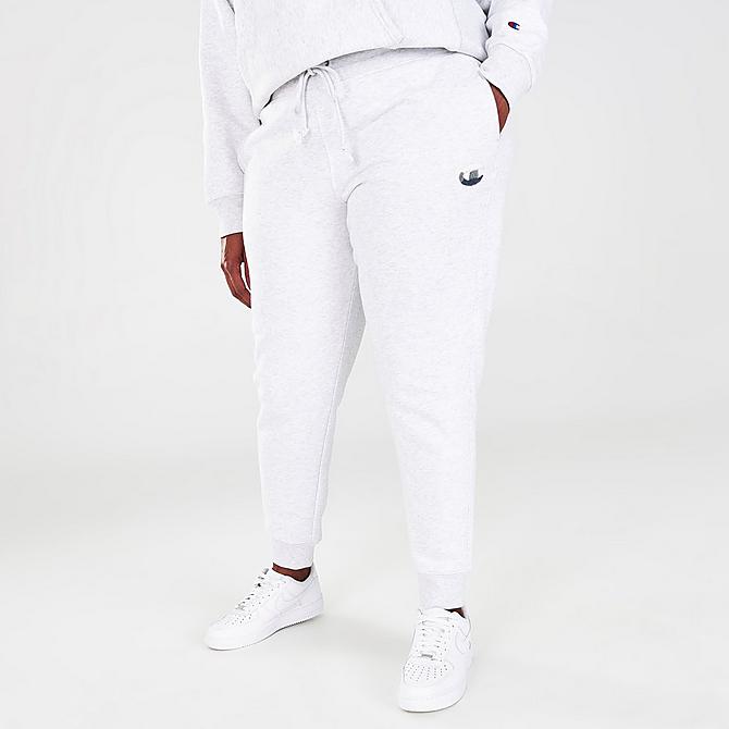 Front Three Quarter view of Women's Champion Reverse Weave Fade Logo Jogger Sweatpants (Plus Size) in Grey/Silver Click to zoom