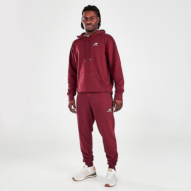 Front view of Men's New Balance Essentials Embroidered Graphic Jogger Pants in NB Burgundy Click to zoom