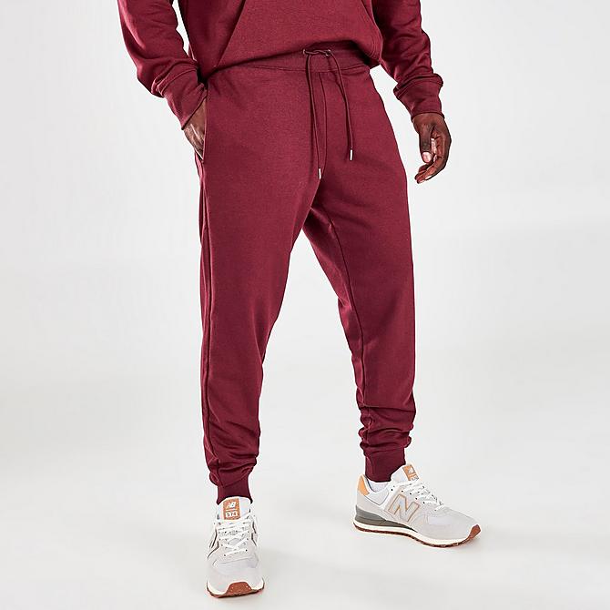 Back Left view of Men's New Balance Essentials Embroidered Graphic Jogger Pants in NB Burgundy Click to zoom