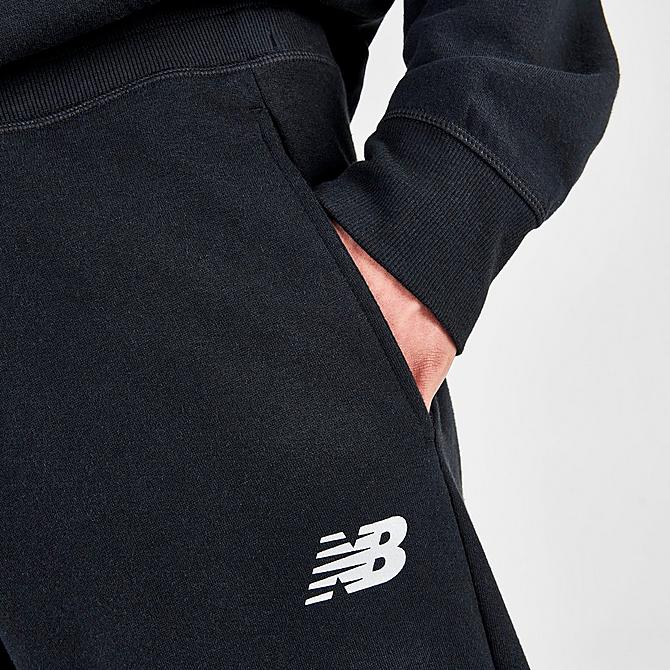 On Model 5 view of Men's New Balance NB Essentials Metallic Jogger Pants in Black Click to zoom
