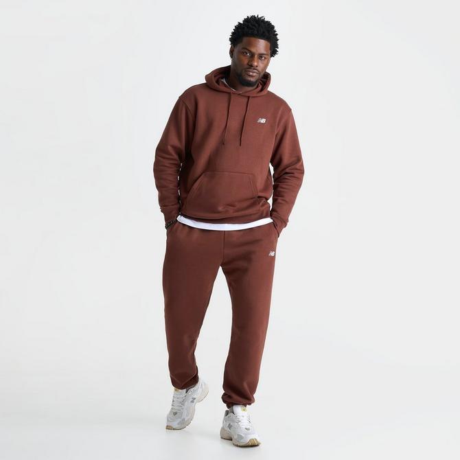 [angle] view of Men's New Balance Sport Essentials Fleece Jogger Pants in Rich Oak Click to zoom