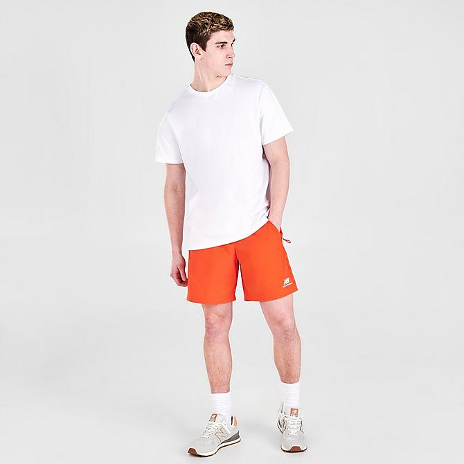Front Three Quarter view of Men's New Balance Athletics Wind Shorts in Poppy Click to zoom