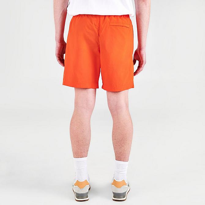 Back Right view of Men's New Balance Athletics Wind Shorts in Poppy Click to zoom