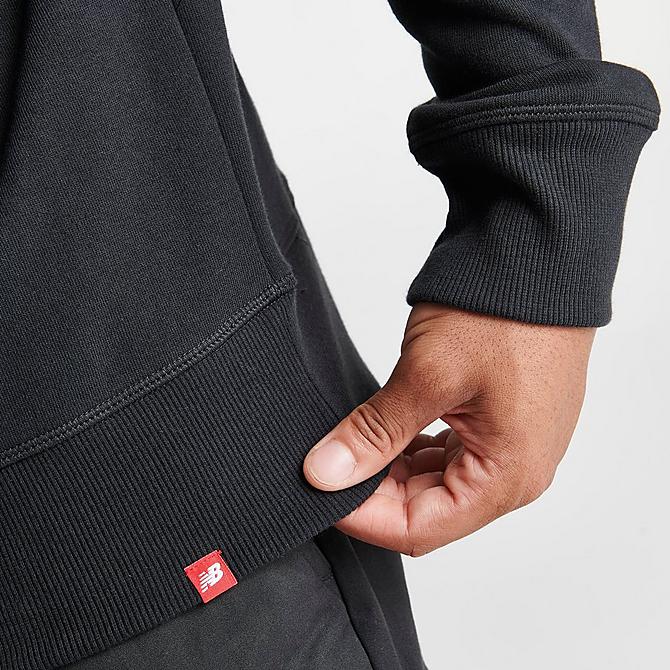 On Model 6 view of Men's New Balance Essentials Stacked Logo Crewneck Sweatshirt in Black Click to zoom