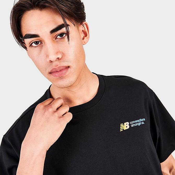 On Model 5 view of Men's New Balance Conversations Amongst Us Brand T-Shirt in Black Click to zoom