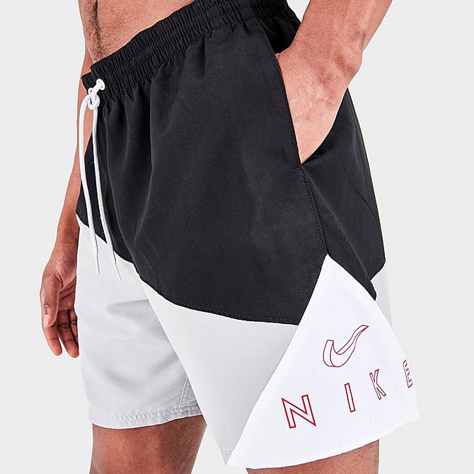 On Model 5 view of Men's Nike Logo Jackknife 7-Inch Volley Swim Shorts in Black/White/Grey Click to zoom