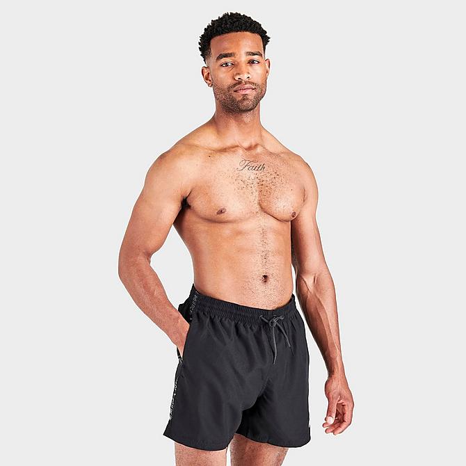 Back Left view of Men's Nike Swoosh Logo Taped 5-Inch Volley Swim Shorts in Black Click to zoom