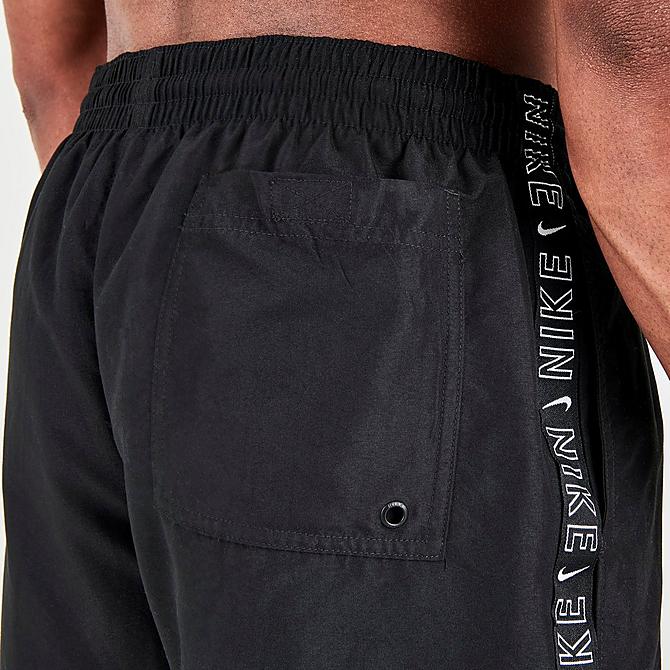 On Model 6 view of Men's Nike Swoosh Logo Taped 5-Inch Volley Swim Shorts in Black Click to zoom