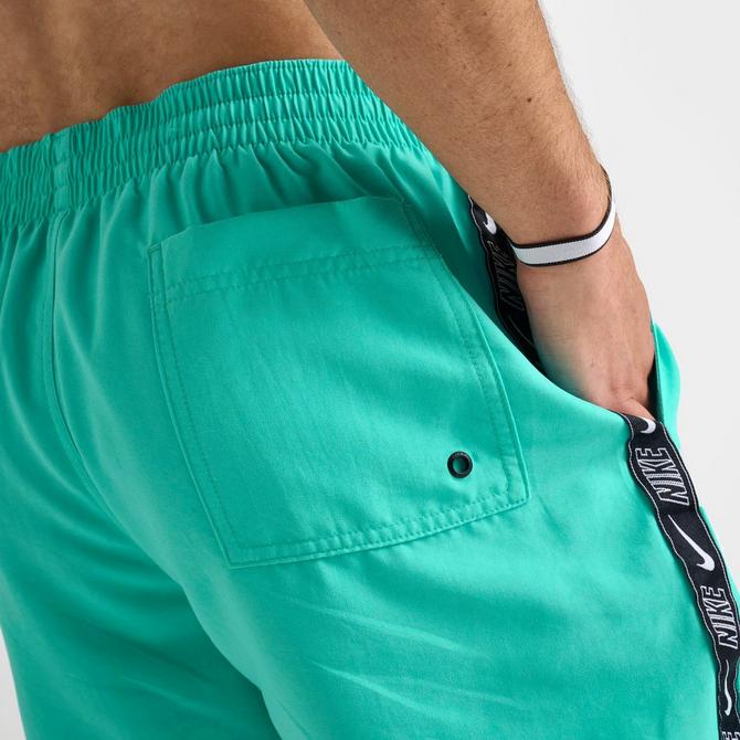 [angle] view of Men's Nike Swim Tape Logo 5" Volley Shorts in Hyper Jade Click to zoom