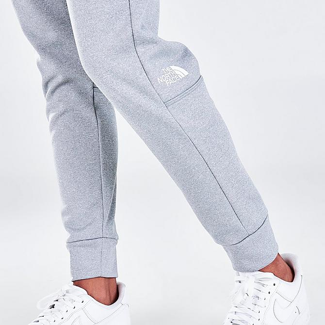 On Model 6 view of Women's The North Face Exploration Fleece Jogger Pants in Light Grey Heather Click to zoom