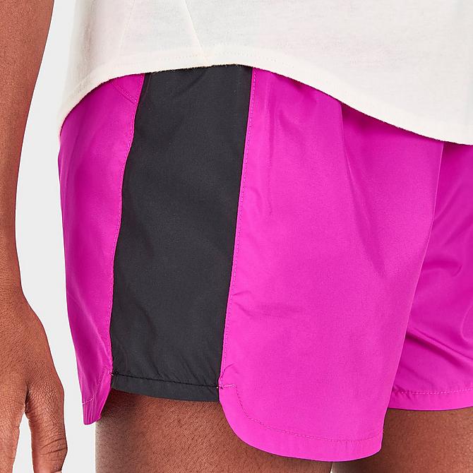 On Model 6 view of Girls' The North Face Never Stop Run Training Shorts in Linaria Pink Click to zoom