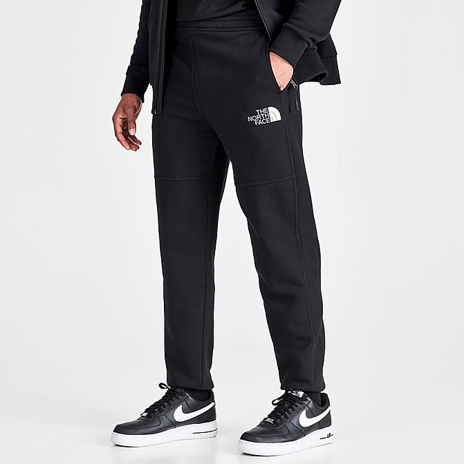 Front view of Men's The North Face Linear Graphic Track Pants in Black Click to zoom