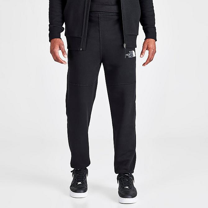 Back Left view of Men's The North Face Linear Graphic Track Pants in Black Click to zoom