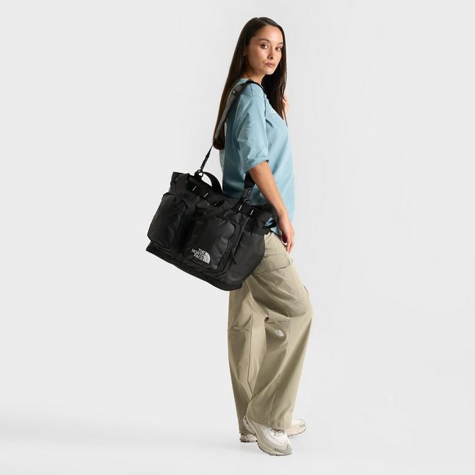 Three Quarter view of The North Face Base Camp Voyager Tote Bag (25L) in TNF Black Click to zoom