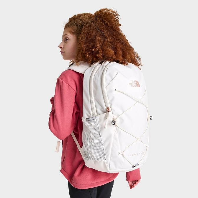 White and coral store north face backpack