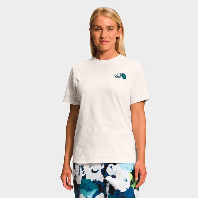 Front view of Women's The North Face NSE Logo T-Shirt in Gardenia White/Blue Coral TNF Lowercase Print Click to zoom