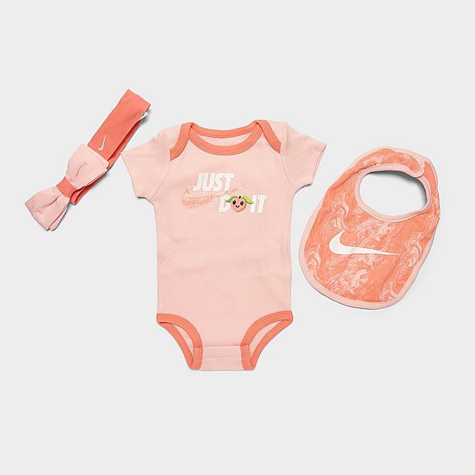 Right view of Infant Nike Lil Peach Bodysuit, Headband and Bib Box Set (3-Piece) in Atmosphere Click to zoom