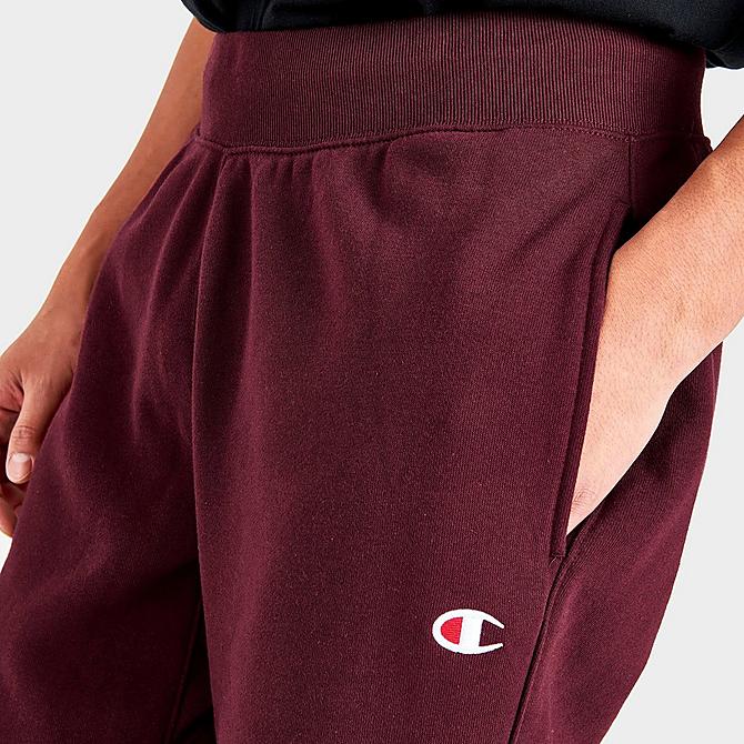 On Model 5 view of Men's Champion Reverse Weave Jogger Pants in Burgundy Click to zoom