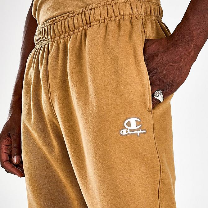 On Model 5 view of Men's Champion "C" Logo Script Fleece Jogger Sweatpants in Khaki Click to zoom