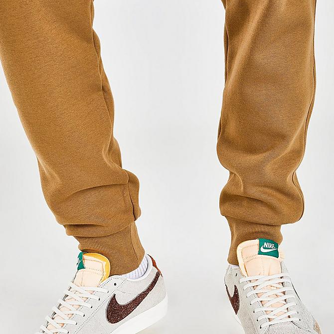 On Model 6 view of Men's Champion "C" Logo Script Fleece Jogger Sweatpants in Khaki Click to zoom